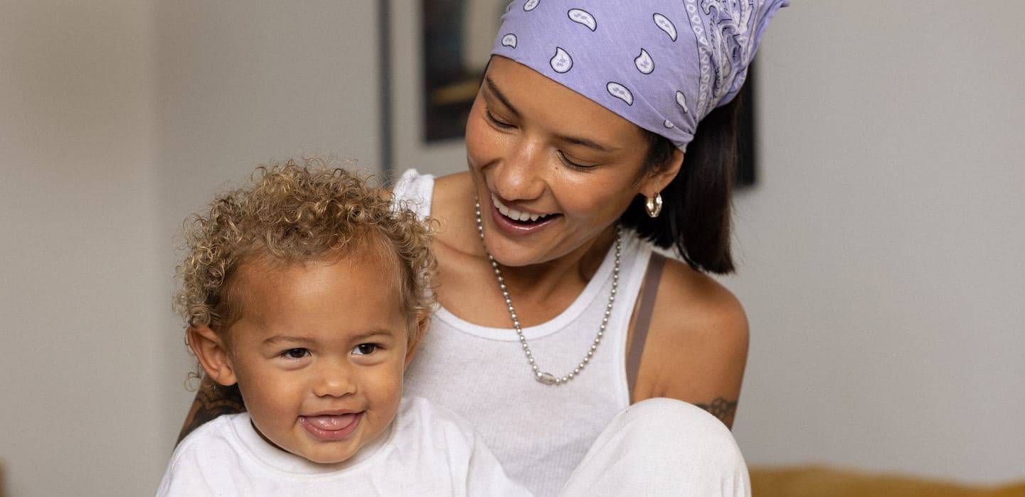 A parent and child featured in Freestyle brand photography
